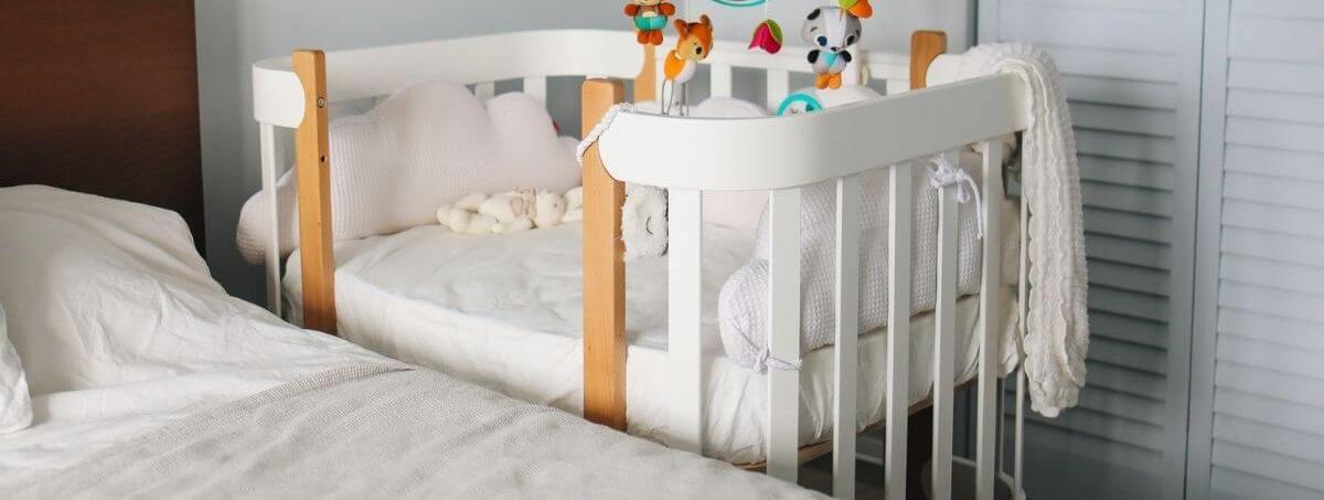 Width of clearance a crib mattress